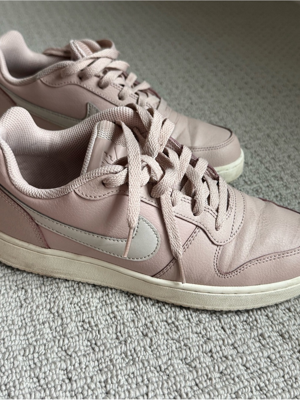 Nike Women’s Blush Pink Low-Top Sneakers with White Swoosh